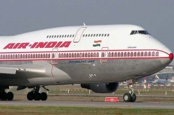 Air India boarding pass features images of PM Modi, Vijay Rupani, sparks row over violation of poll norms