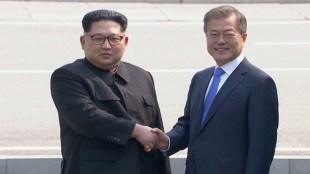 North Korean leader Kim Jong Un shakes hands with South Korean President Moon Jae-in as both of them arrive for the inter-Korean summit at the truce village of Panmunjom, in this still frame taken from video, South Korea April 27, 2018.