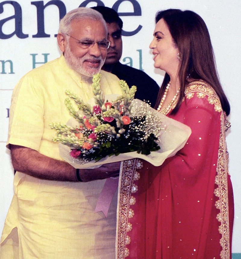 PM Narendra Modi is welcomed by Reliance Industries' Nita Ambani and Mukesh Ambani on his arrival for the re-dedication and inauguration of HN Reliance Foundation Hospital in Mumbai. PTI