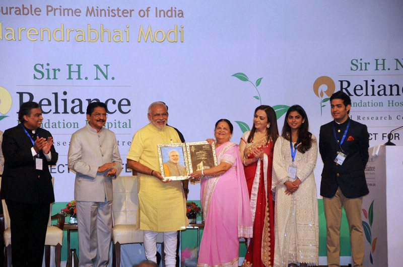 PM Narendra Modi is welcomed by Reliance Industries' Nita Ambani and Mukesh Ambani on his arrival for the re-dedication and inauguration of HN Reliance Foundation Hospital in Mumbai. PTI