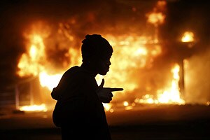 The racially charged case has stoked passions nationwide, triggering debates over the relationship between black communities and law enforcement. (Reuters)