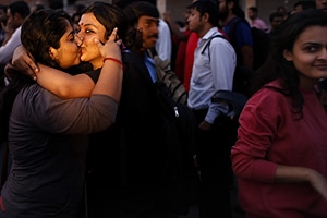 Women kiss each other to express support to the 'Kiss of Love’ campaign near the Hindu right-wing Rashtriya Swayamsevak Sangh (RSS) headquarters in New Delhi, India, Saturday, Nov. 8, 2014. The campaign was launched to protest alleged moral policing by Hindu right-wing organizations in India. (AP) Women kiss each other to express support to the 'Kiss of Love’ campaign near the Hindu right-wing Rashtriya Swayamsevak Sangh (RSS) headquarters in New Delhi, India, Saturday, Nov. 8, 2014. The campaign was launched to protest alleged moral policing by Hindu right-wing organizations in India. (AP)