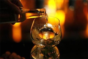 Acting on a tip off, the police intercepted a four wheeler at Guthni Bazar and seized 150 cartons, each containing 24 bottles of country-made liquor. (Reuters)