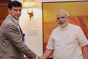 Narendra Modi does a first, takes a dig at Guv Raghuram Rajan-led RBI