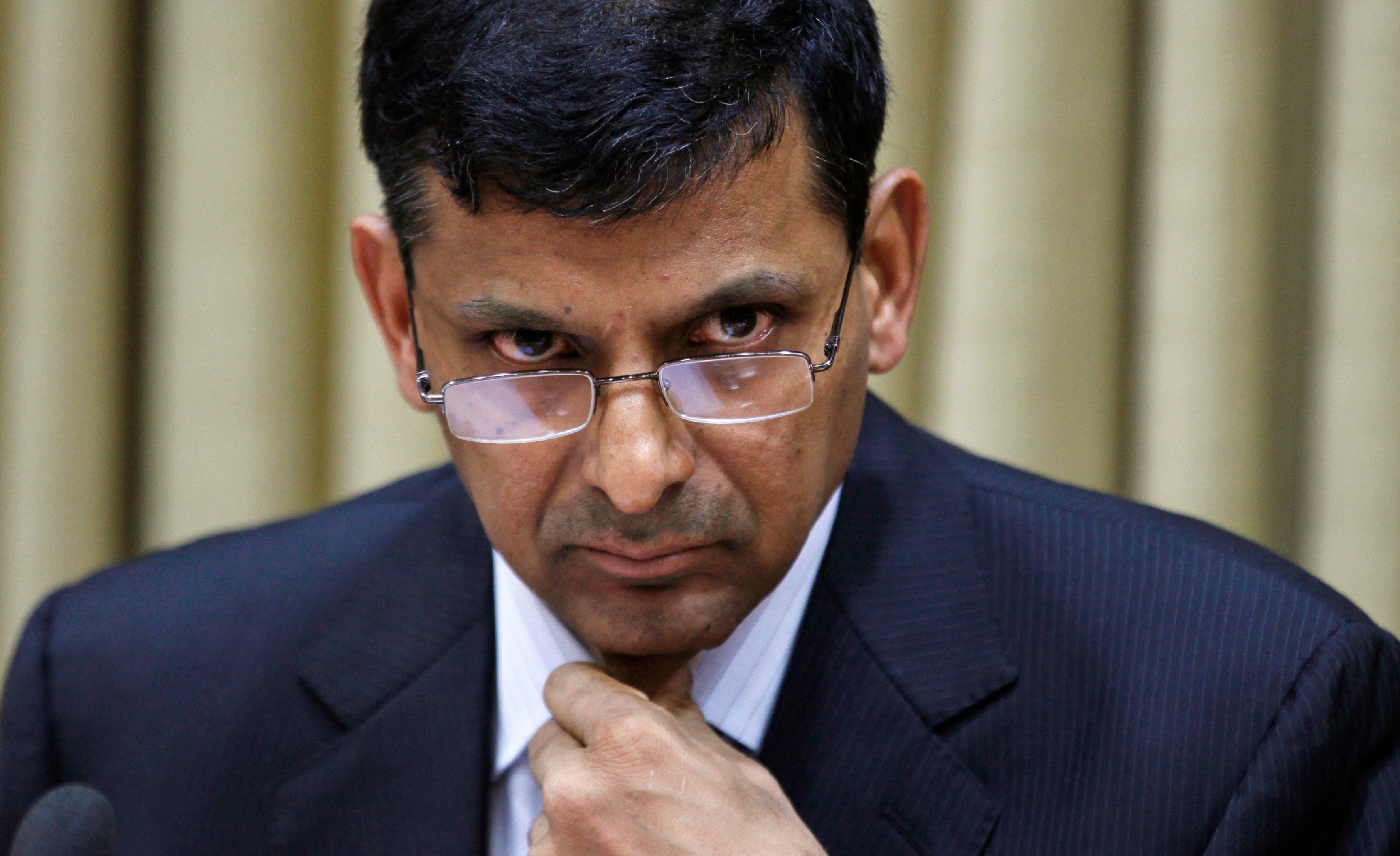 <b>Rs 5,73,000 cr</b> or 12.57% of gross advances of public sector bank loans is stuck in non-performing assets and restructured debt of corporates</br> <br><b>Rs 39,516 crore:</b> Total defaults during the 12-month period ended September 2014 (AP)