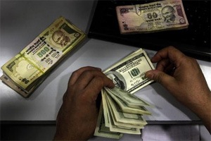 Indian rupee gains 8 paise against dollar in early trade Indian rupee gains 8 paise against dollar in early trade