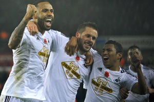 Swansea fightback stuns Arsenal in Premier League
