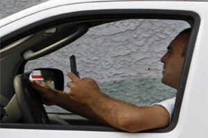 Survey finds people text and drive knowing dangers