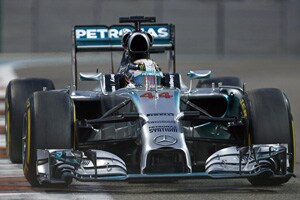 Lewis Hamilton wins Abu Dhabi Grand Prix, claims second world title
