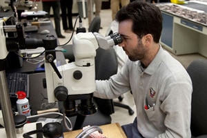 A researcher in the UK has developed a high-tech microscope that can make expensive tests. (Reuters)