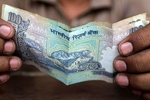 Indian rupee gains 2 paise against US dollar in early trade