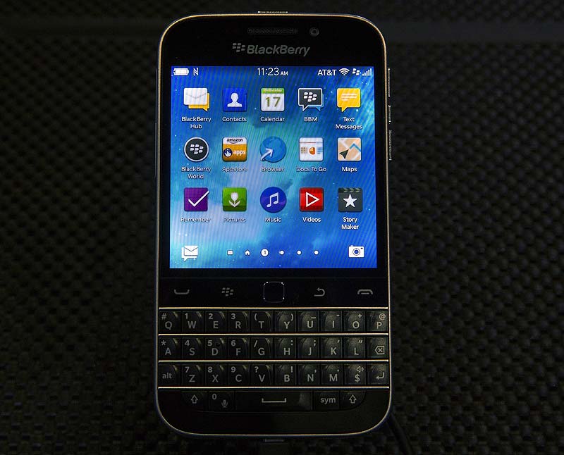 The BlackBerry Classic is classic BlackBerry. No one else would have placed all their bets on a QWERTY keyboard for a 2014 smartphone. But BlackBerry knows that if people will stay with it or come back it has to be for the keyboard, and of course the extra layer of security. (In pic) The new Blackberry Classic smartphone is displayed during the launch event in New York. (Reuters) <a href="https://www.financialexpress.com/article/industry/tech/blackberry-classic-will-woo-touch-weary-world-with-classic-keyboard-trackpad/20469/">Read full story</a>