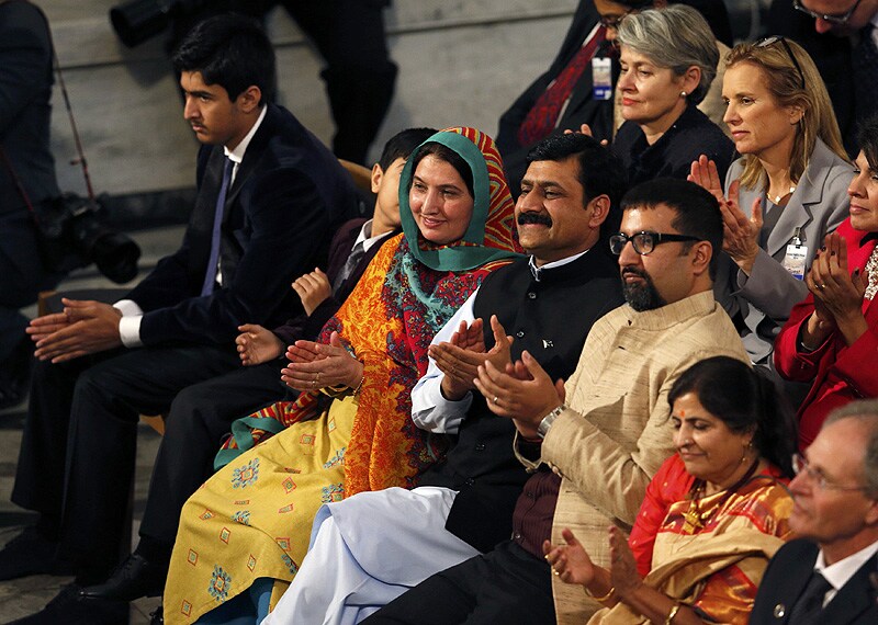 Family members of Nobel Peace Prize laureates Malala Yousafzai and Kailash Satyarthi applaud during the Nobel Peace Prize awards ceremony. (Reuters)