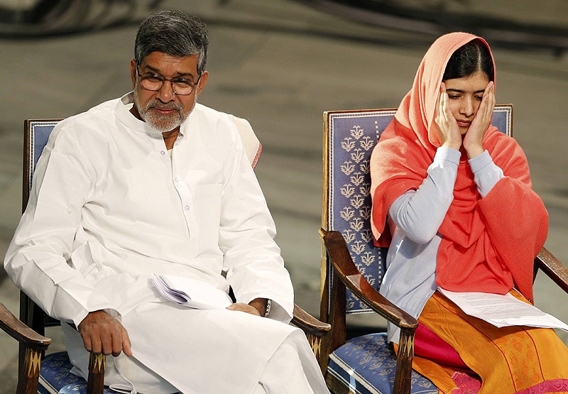 Nobel Peace Prize laureates Malala Yousafzai (R) and Kailash Satyarthi attend the Nobel Peace Prize awards ceremony at the City Hall. (Reuters)