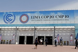 People walk at the venue of the UN Climate Change Conference COP 20 in Lima.