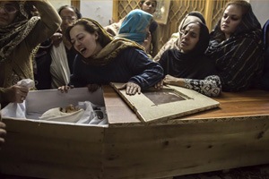 Pakistan in mourning as parents bury children after school attack that killed 132 students