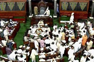 Trinamool Congress displayed in both Lok Sabha and Rajya Sabha the copies of some red diary, allegedly recovered from Sahara group chief Subrata Roy, and claimed that it contained name of a BJP leader. (PTI)