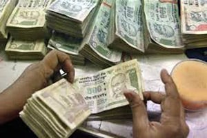 Depositories provide details of shareholders and bondholders including name, address and bank details to the respective issuer companies which, in turn, arrange for distribution of cash benefits. (Reuters)