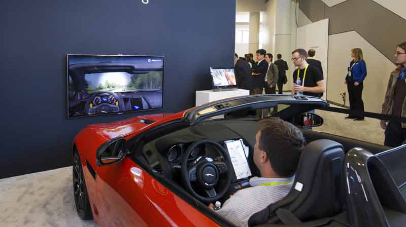 Rodney Stewart demonstrates electronic safety features built into a Jaguar convertible at the Intel booth during the 2015 International Consumer Electronics Show (CES) in Las Vegas, Nevada. (Reuters)
