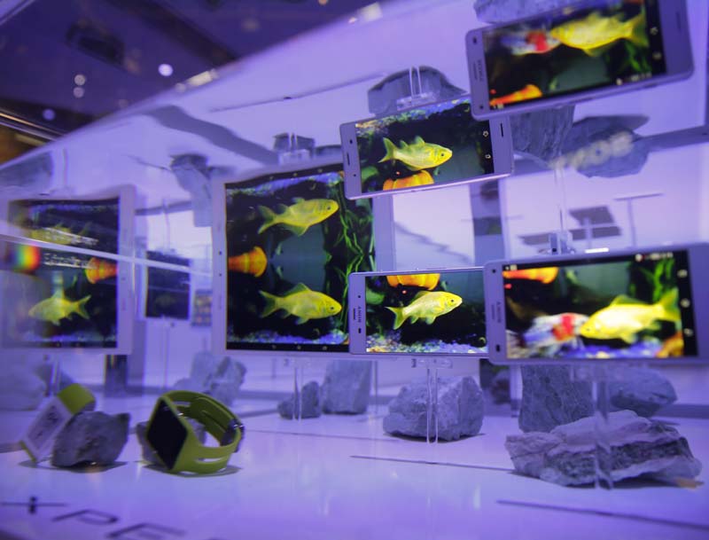 Sony Xperia Z3 tablet and smartphones are displayed in water at the Sony booth during a news conference at the International CES Monday, in Las Vegas. (AP)