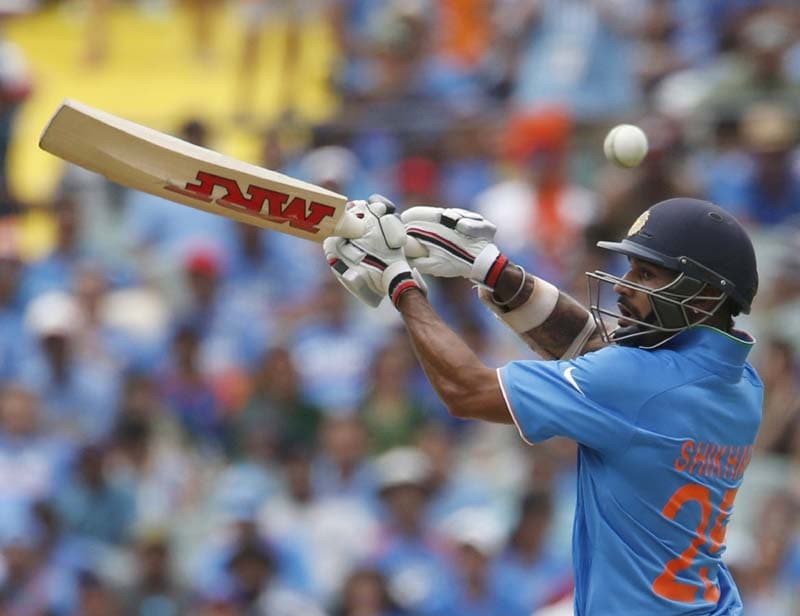 Shikhar Dhawan, india pakistan, india pakistan match photo, india vs pakistan, india pakistan match, india pakistan match photos, match pictures ind pak, india pakistan world cup, india pakistan world cup gallery, india pakistan gallery, cricket news, cricket