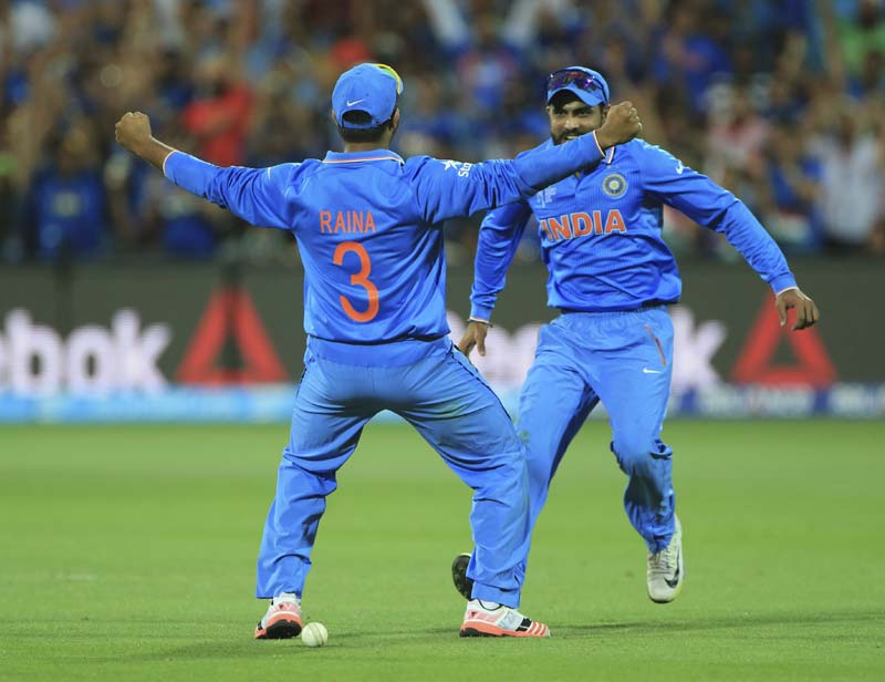 Ravindra Jadeja, Suresh Raina, india pakistan, india pakistan match photo, india vs pakistan, india pakistan match, india pakistan match photos, match pictures ind pak, india pakistan world cup, india pakistan world cup gallery, india pakistan gallery, cricket news, cricket