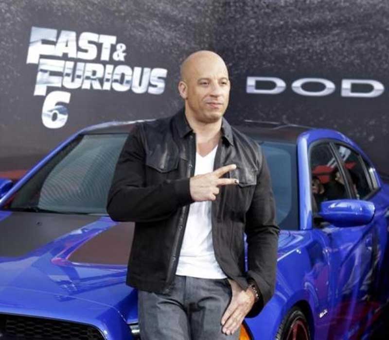 Fast and Furious 7 is all set to reach out to the theaters this April worldwide. The movie series has always been the center of attraction for its extra ordinary car stunts. And this being the final chapter of the movie, it is believed that the unusual showcase of high flying car feat will go to the next level. This seventh installment of Fast and Furious series will showcase not only some of the expensive cars but also the fastest that are also rarely available in the market. So let’s have a look at these fast-paced and expensive cars that will be seen in this movie. <br><i>Caption: Cast member and producer Vin Diesel poses at the premiere of the new film.</br></i>
