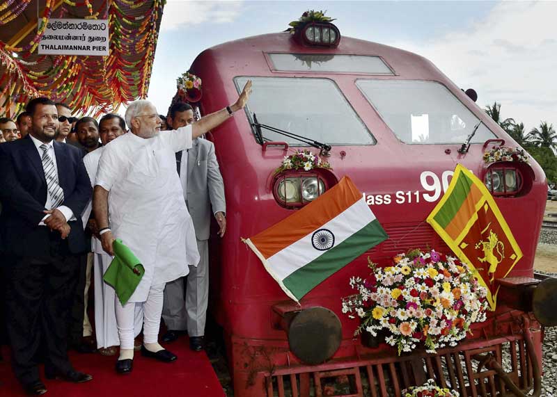 Prime Minister Narendra Modi waves during the flag off a train service at Talaimannar in Sri Lanka on Saturday. PTI