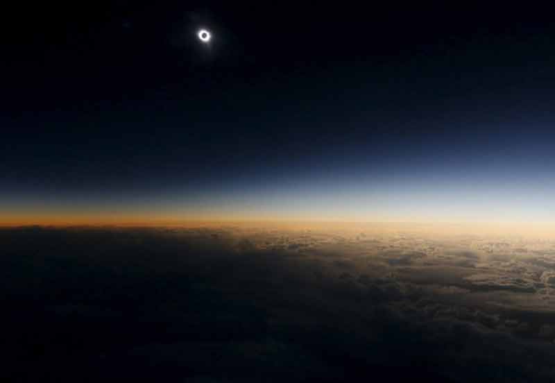 A view from a plane during the so-called "Eclipse Flight" from the Russian city of Murmansk to observe the solar eclipse above the neutral waters of the Norwegian Sea. (Reuters)