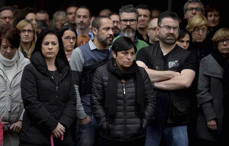 People hold a minute of silence in front of Liceo of Barcelona in Barcelona, Spain, Wednesday, March 25, 2015. (AP/PTI)