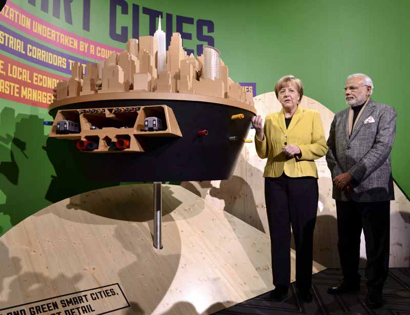 narendra modi news, Narendra Modi, PM Narendra Modi, industrial fair Hannover, make in india, make in india campaign, narendra modi make in india, Germany industrial fair, Prime Minister Narendra Modi, Angela Merkel, germany, narendra modi in germany, india news, world news