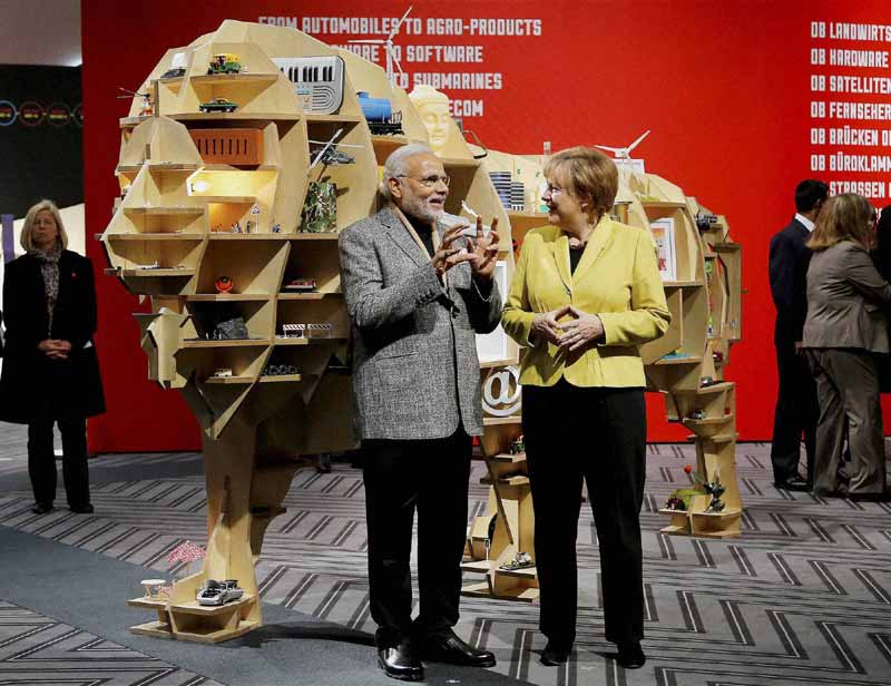 narendra modi news, Narendra Modi, PM Narendra Modi, industrial fair Hannover, make in india, make in india campaign, narendra modi make in india, Germany industrial fair, Prime Minister Narendra Modi, Angela Merkel, germany, narendra modi in germany, india news, world news