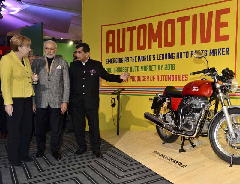 narendra modi news, Narendra Modi, PM Narendra Modi, industrial fair Hannover, make in india, make in india campaign, narendra modi make in india, Germany industrial fair, Prime Minister Narendra Modi, Angela Merkel, germany, narendra modi in germany, india news, world news