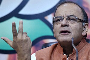 Finance Minister Arun Jaitley addressing the media on one year of Prime Minister Narendra Modi's government, at the Bharatiya Janata Party (BJP) headquarters in New Delhi on Saturday. PTI