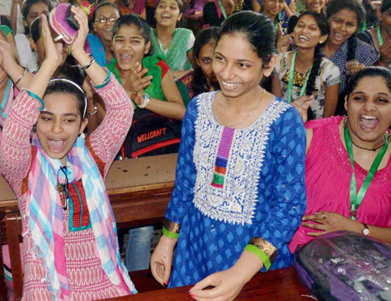 Girls outshine boys in the Maharashtra HSC 2015 exam results: </br> The 12th standard HSC examination held in Maharashtra in March this year has registered an overall pass percentage of 91.26, with girls having an edge over boys in the results announced today. An estimated 12.37 lakh students appeared for the examination in which out of nine regional divisions of the Maharashtra Secondary and Higher Secondary Education Board, Konkan topped the list with passing percentage of 95.68 with Nasik division being at bottom at 88.13 per cent. While 88.80 per cent boys were successful, girls outnumbered them with a passing percentage of 94.29, Gangadhar Mahmane, chairman of the board told reporters here. (PTI) (27/05/2015)