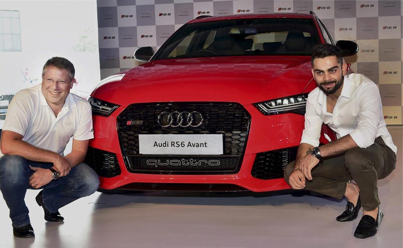Audi RS6 Avant: “We believe it’s about time to introduce the Avant to luxury connoisseurs in the country…we are confident that the elegant dynamics of the car will appeal to auto enthusiasts seeking style, speed and luxury,” Audi India Head Joe King said. (PTI) </br><br><strong>Read more:</strong> <a href="https://www.financialexpress.com/article/industry/automobiles/audi-launches-sports-car-rs6-avant-priced-at-rs-1-35-cr/80224/"><strong>Virat Kohli launches Audi RS6 Avant priced at Rs 1.35 cr</strong></a>