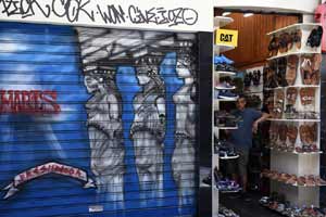A shop owner waits for customers in the Monastiraki tourist district of Athens. (AP)