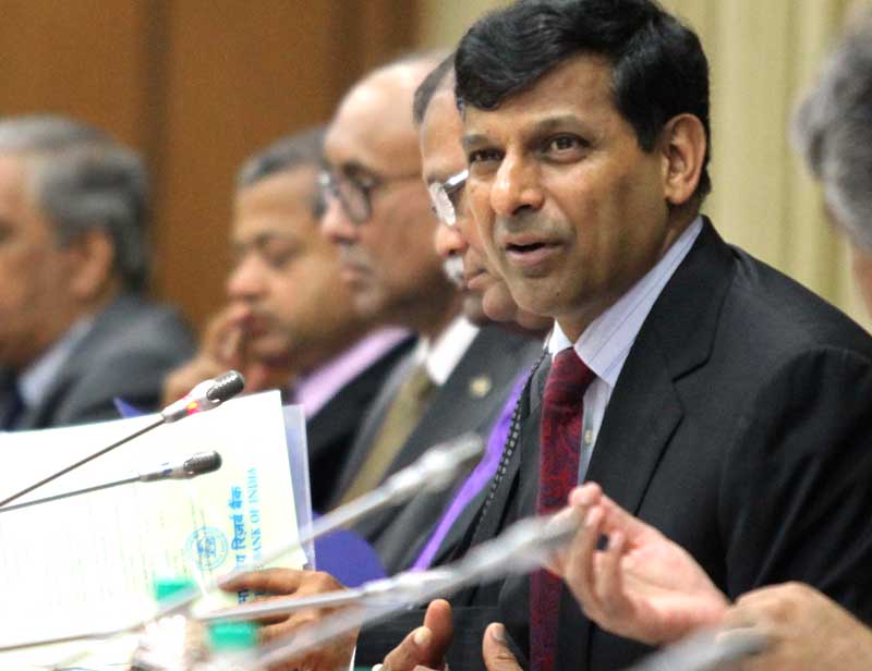 RBI monetary policy review: In a big boost to the Indian economy and loan takers, the Reserve Bank of India (RBI) Governor Raghuram Rajan today cut repo rate by 50 bps (0.50 per cent) and relaxed norms for home loan seekers. RBI reduced the key rate (repo) by 50 basis points from 7.25 per cent to 6.75 per cent with immediate effect. RBI Governor Raghuram Rajan said: "Further monetary policy accommodation will be conditioned by the abating of recent inflationary pressures, the full monsoon outturn, possible Federal Reserve actions and greater transmission of its front-loaded past actions." Looking forward, he said inflation is likely to go up from September for a few months as favourable base effects reverse. The outlook for food inflation could improve if the increase in sown area translates into higher production. Moderate increases in minimum support prices should keep cereal inflation muted, while subdued international food price inflation should continue to put downward pressure on the prices of sugar and edible oil, and food inflation more generally." (Express photo by Prashant Nadkar)