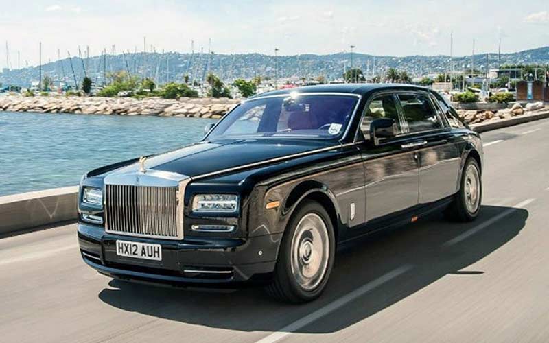 10. Rolls Royce Phantom 2.0 Revises Aesthetics </br> Rolls-Royce Phantom is likely to come as a complete makeover, breaking the custom, after 10 years. If an Automobile Magazine is to be believed the re-engineered Phantom will have a ‘more modern’ and sleek appearance with a taller grille and informal C-pillars. (Image: CarDekho)