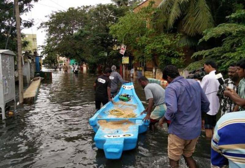 <b>Ola provides ferry service in water-logged Chennai for free</b>: Taxi operator Ola has deployed boats along with professional rowers to rescue people in the waterlogged areas of Chennai to safer places. "Ola deployed boats in waterlogged and partially submerged areas on the basis of information from the Fire and Rescue department", Ola said in a statement. The boats were manned by professional rowers and also fishermen to rescue people and to provide food and drinking water free-of-cost. "We are working closely with local stakeholders to help ferry those stranded in water-logged areas.", Ola Business Head (Tamil Nadu), Ravi Teja said. (Twitter photo) (17/11/2015)