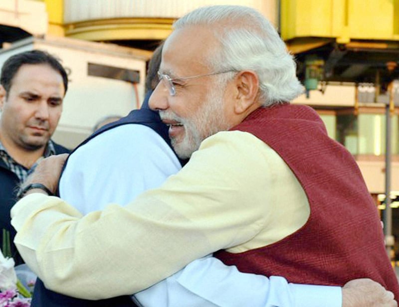 5. Narendra Modi Pakistan visit: Indian sources said the idea of a visit by PM Narendra Modi emanated from a conversation between the two prime ministers in morning when Modi called Sharif from Kabul to greet him on his 66th birthday. Describing Modi's stopover here as unscheduled, Pakistan's Foreign Secretary Aizaz Ahmed Chowdhury said that the decision about the trip was taken during the conversation when the Indian premier called up Sharif to greet him on his birthday. "He (Modi) did not know about the marriage," he said. "Today is the baraat (wedding ceremony) of Mehrun Nisa and PM Sharif had invited Modi when he called him by phone," a PML-N senior leader said. (PTI photo)