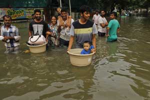 chennai floods, chennai flood news, chennai floods update, chennai flood situation, floods in chennai, floods in chennai 2015, chennai floods assocham, chennai floods today, loses in chennai floods, loses in chennai rains, chennai rains loses today