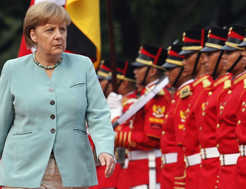 Angela Merkel has been a dominant figure in shaping Europe's response to the debt crisis that started unfolding in Greece six years ago and flared anew this year. She has insisted that countries carry out painful economic reforms and cut spending in exchange for aid, and was instrumental in getting the International Monetary Fund involved. She has faced criticism abroad for her hard-nosed emphasis on austerity and insistence that there can't be a quick fix, but also has had to fend off critics at home who opposed bailouts for eurozone strugglers. (Reuters photo)