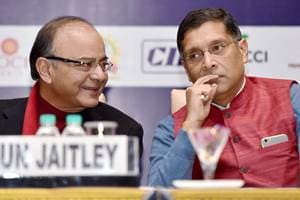 New Delhi: Finance Minister Arun Jaitley and Chief Economic Advisor Arvind Subramaniam at a session on "GST in India" jointly organised by CII, FICCI and ASSOCHAM in New Delhi on Wednesday. PTI Photo by Kamal Singh (PTI12_16_2015_000150B)