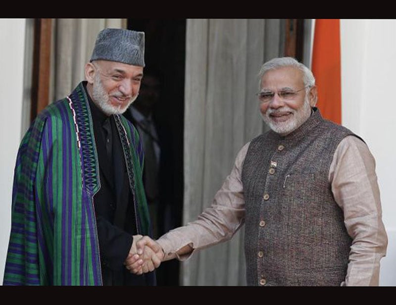 9. Narendra Modi Afghanistan visit: "For, the promise and the opportunities of the 21st century belong to Afghan youth as much as anyone else in the world. For India, this is a deeply held commitment. Your suffering is our pain. Your dreams are our duty. Your strength is our belief. Your courage is our inspiration. Above all, your friendship is our honour," he told Afghan lawmakers. (PTI photo)
