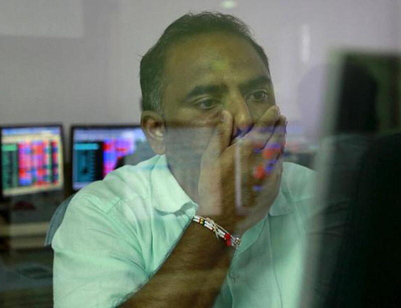 Sensex: The year 2015 marked the worst single-day loss on August 24 when the Sensex took a sharp plunge of 1,624.51 points following a steep devaluation of Chinese currency yuan in the beginning of August. After a roller-coaster ride, Dalal Street is headed for its worst performance in four years in 2015 — when foreign investors pushed the benchmark Sensex to a life-time high before puncturing the rally by pulling out billions of dollars from their ‘favourite’ market. The Sensex has lost over 1,600 points in 2015, after gaining nearly 30 per cent in the previous year. The index had last registered an yearly loss in 2011 when it fell 24 per cent. (Reuters photo) <br><a href="https://www.financialexpress.com/topic/year-ender-2015/"><strong>Full coverage: Year-Ender 2015</strong></a></br>