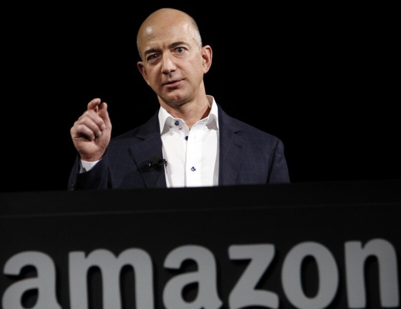 Amazon’s Jeffrey Bezos with a net worth of $56.6 billion and US business tycoon David Koch with $47.4 billion made the top five richest people in the world. (AP)