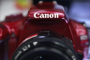 The camera and office equipment giant reported a 220.21 billion yen ($1.86 billion) net profit for the year to December, while operating profit slipped 2.3 per cent to 355.21 billion yen. (Reuters)
