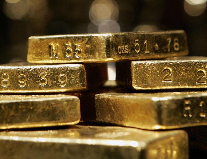 2. Why should I buy Sovereign Gold Bond Scheme rather than physical gold? What are the benefits? The quantity of gold for which the investor pays is protected, since he receives the ongoing market price at the time of redemption/ premature redemption. The SGB offers a superior alternative to holding gold in physical form. The risks and costs of storage are eliminated. Investors are assured of the market value of gold at the time of maturity and periodical interest. SGB is free from issues like making charges and purity in the case of gold in jewellery form. The bonds are held in the books of the RBI or in demat form eliminating risk of loss of scrip etc. (Image Source: Reuters)