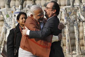 Prime Minister Narendra Modi hugs France's President Francois Hollande (R) during their visit to the Rock Garden in Chandigarh. (Reuters)